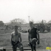 L-R Bugs(?) Gene Mikovilje with Mess Hall in background