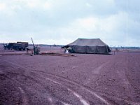 The first tent goes up in the new Service Battery area