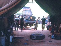 The maintenance tent and maintenance on a 5-ton truck