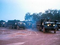 Convoy leaving Service Battery at dawn for Phuoc Vinh