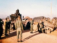 Just outside the Service Battery gate, a truck already in trouble; Captain McElroy, BC, looking on; SSG Harrell Lewis, battery motor sergeant, not happy