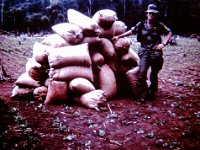 1LT Jones with captured rice.  Copyright 2014 Melvin Jones, John Girardeau &#38; www.quanloi.org