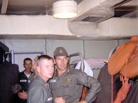Fire drill on the Troop Ship Gordon...I think this drill was after the brig was set on fire during our stop at Okinawa.  Visible in the picture are, left to right, Lt Mike Winslow, Lt Pete Flury (I think), me, and Lt John Gerzel.
