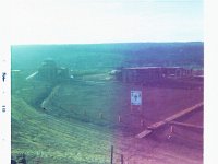 Gun Pad #3, with fighting position.  May 11, 1969 both the fighting position and gun took hits from RPG's.  Photo at first looks like a double exposure, but is a single photo with messed-up color processing.